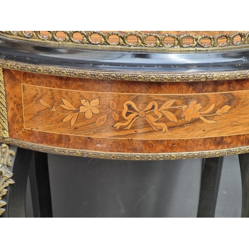 1043 - A Louis XV style burr walnut, ebonised and inlaid jardiniere, 46cm wide.