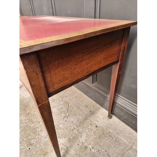 1055 - A circa 1900 mahogany and inlaid bowfront writing table, 107cm wide.