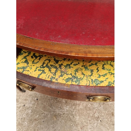 1055 - A circa 1900 mahogany and inlaid bowfront writing table, 107cm wide.