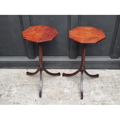 1057 - A pair of Regency style mahogany octagonal tripod tables, 37.5cm wide.