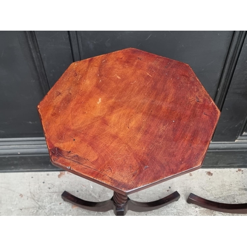 1057 - A pair of Regency style mahogany octagonal tripod tables, 37.5cm wide.