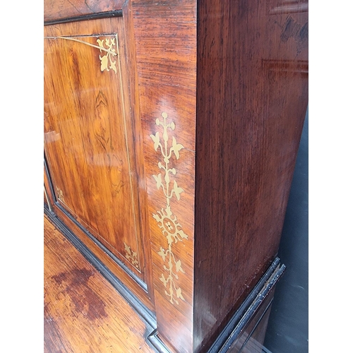 1059 - A George IV rosewood and brass inlaid chiffonier, 107.5cm wide.