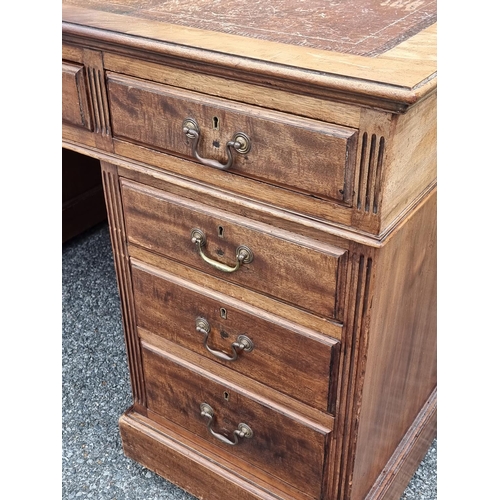 1060 - An early 20th century mahogany partners' pedestal desk, with drawers to each opposing side, 152.5 x ... 