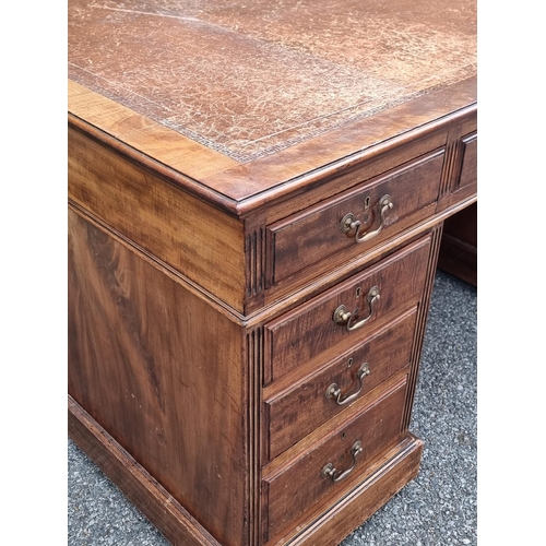 1060 - An early 20th century mahogany partners' pedestal desk, with drawers to each opposing side, 152.5 x ... 