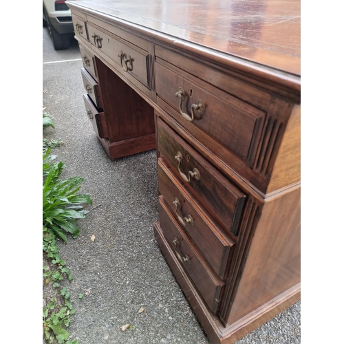 1060 - An early 20th century mahogany partners' pedestal desk, with drawers to each opposing side, 152.5 x ... 