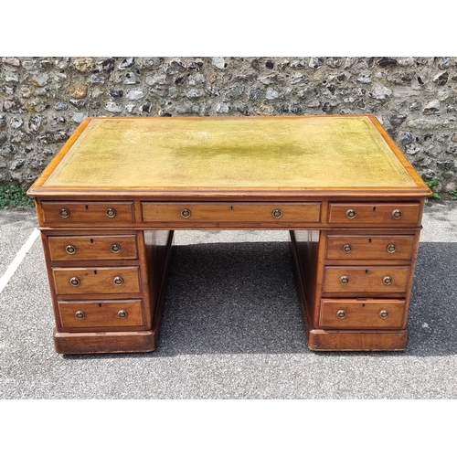 1061 - A Victorian mahogany partners' pedestal desk, with cupboards to one opposing side, 151.5 x 105cm.... 