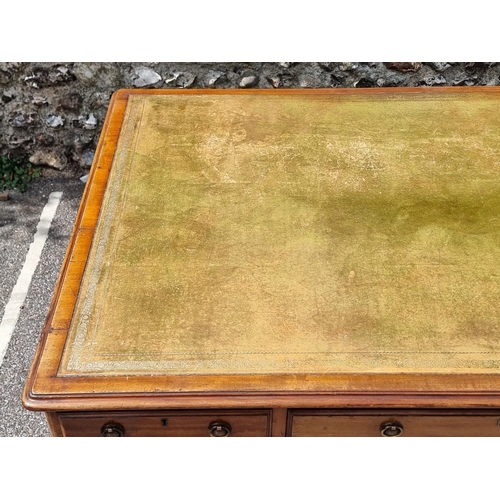 1061 - A Victorian mahogany partners' pedestal desk, with cupboards to one opposing side, 151.5 x 105cm.... 