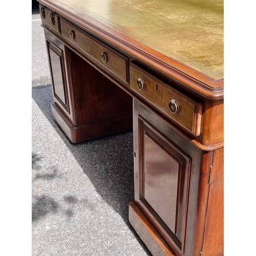 1061 - A Victorian mahogany partners' pedestal desk, with cupboards to one opposing side, 151.5 x 105cm.... 