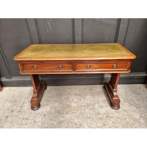 1064 - A Victorian mahogany writing table, 119.5cm wide.