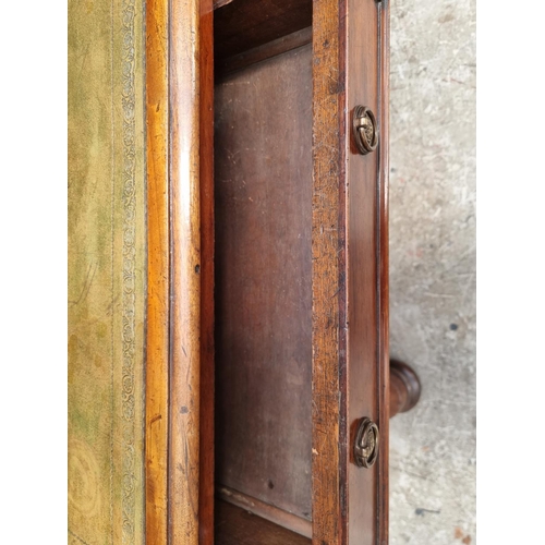 1064 - A Victorian mahogany writing table, 119.5cm wide.