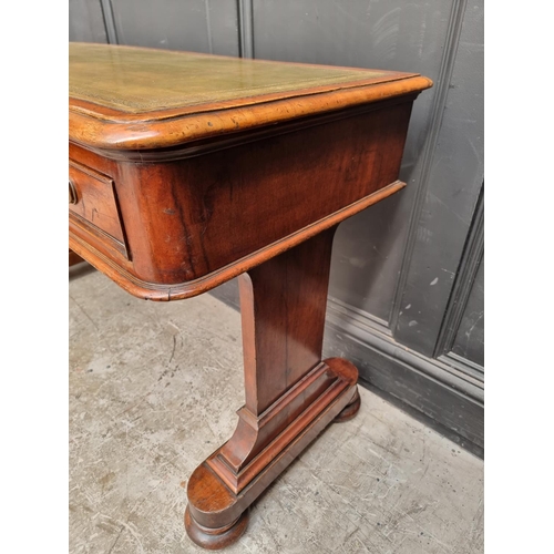 1064 - A Victorian mahogany writing table, 119.5cm wide.