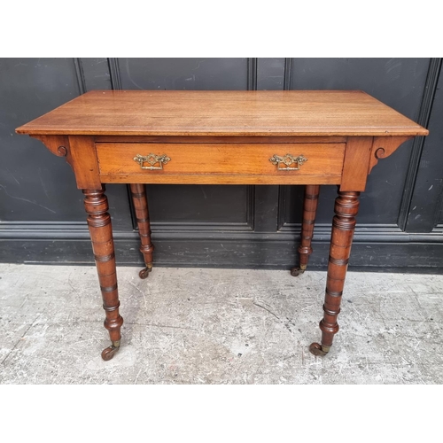 1065 - A late Victorian mahogany single drawer side table, stamped 'Edwards and Roberts', 91cm wide.... 