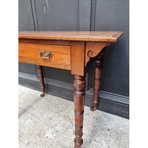 1065 - A late Victorian mahogany single drawer side table, stamped 'Edwards and Roberts', 91cm wide.... 