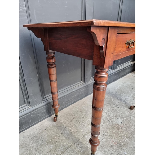 1065 - A late Victorian mahogany single drawer side table, stamped 'Edwards and Roberts', 91cm wide.... 