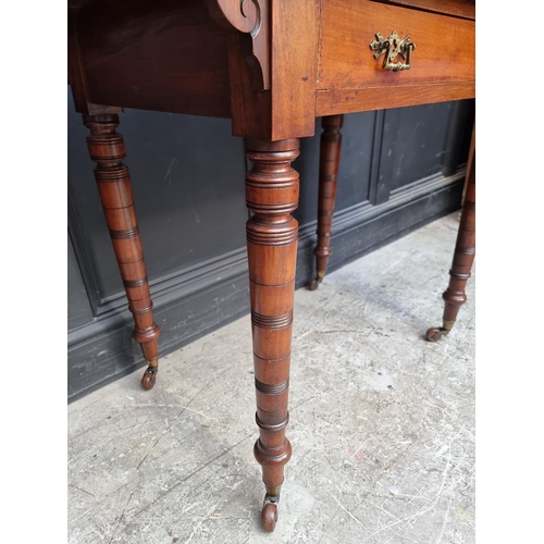 1065 - A late Victorian mahogany single drawer side table, stamped 'Edwards and Roberts', 91cm wide.... 