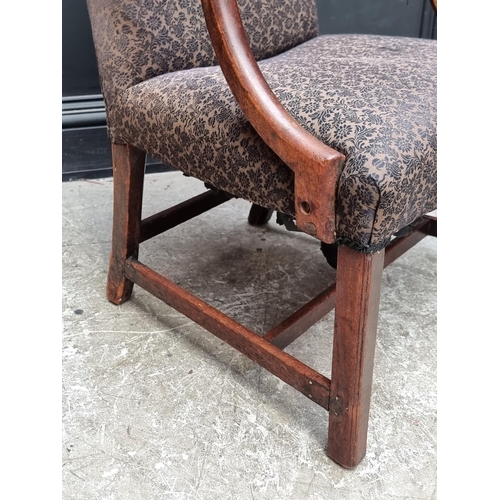 1072 - A George III mahogany elbow chair.