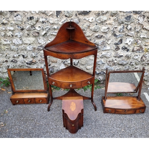 1081 - A group of Georgian mahogany furniture, comprising: a corner washstand; two toilet mirrors; and a kn... 