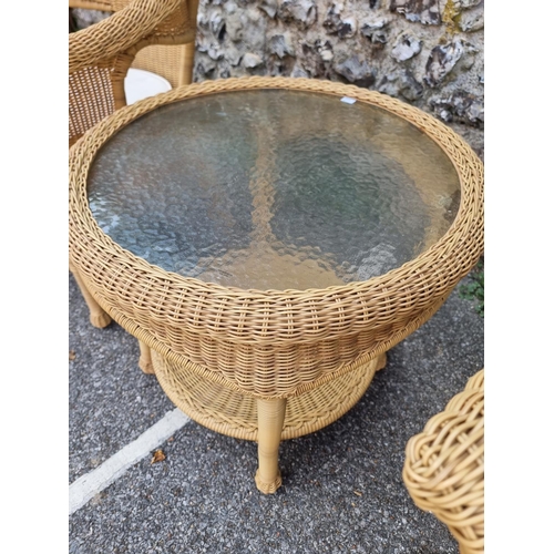 1082 - A pair of simulated wicker conservatory chairs and matching circular table, by Summer Castle, the ta... 