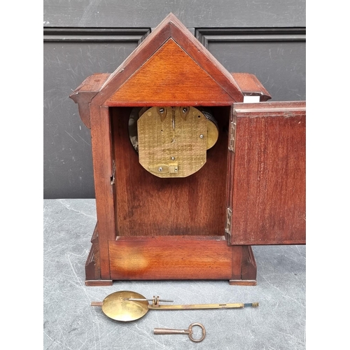 1100 - Railwayana: a Gothic mahogany LNER fusee mantel clock, the 7in painted dial bearing ivorine pla... 