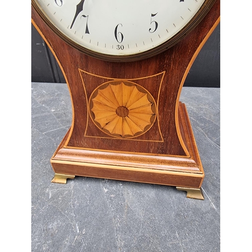 1102 - A circa 1900 mahogany and inlaid balloon form mantle clock, 29cm high, with pendulum.... 