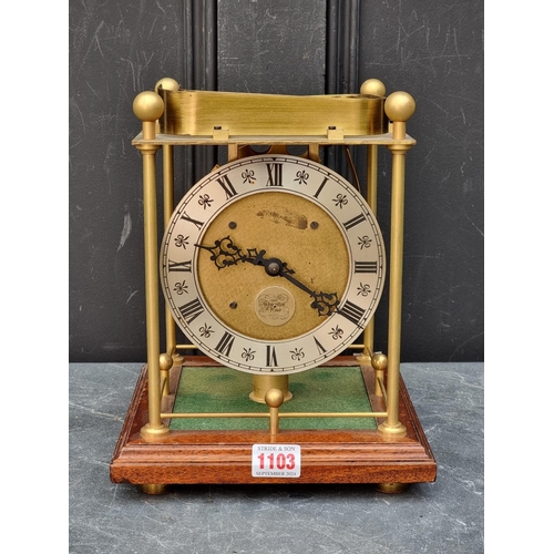 1103 - A mahogany and brass rolling ball timepiece, by Thwaites & Reed, 26.5cm high, with thirty three ... 