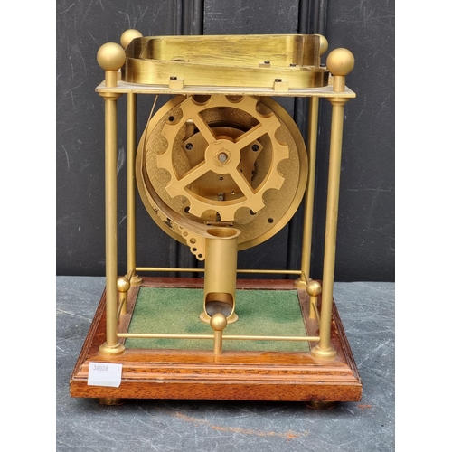 1103 - A mahogany and brass rolling ball timepiece, by Thwaites & Reed, 26.5cm high, with thirty three ... 