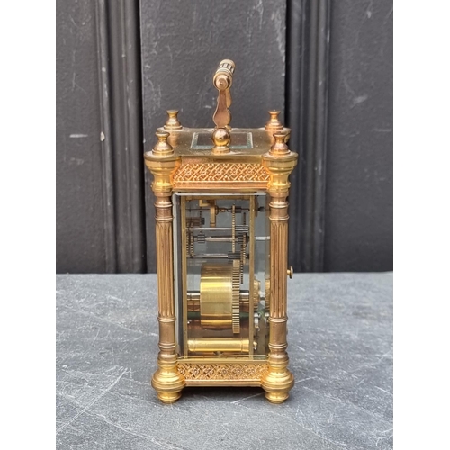 1104 - An antique French gilt brass carriage timepiece, height including handle 15.5cm.... 