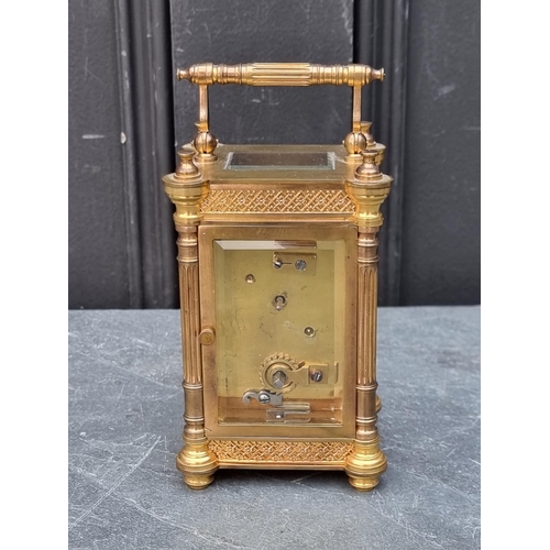 1104 - An antique French gilt brass carriage timepiece, height including handle 15.5cm.... 