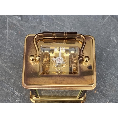 1105 - A Halcyon Days limited edition 'The Big Ben Millennium Clock' carriage timepiece, No.128/250, with c... 