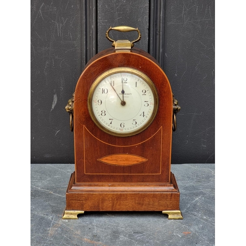 1109 - An Edwardian mahogany and inlaid dome top mantel timepiece, the enamel dial inscribed 'Frodsham, Lon... 