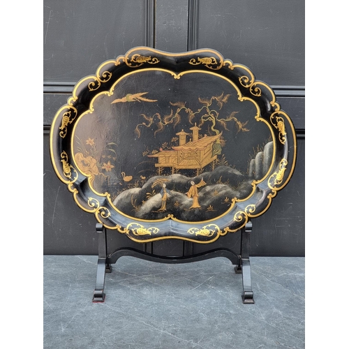 1110A - A good 19th century chinoiserie papier mache tray, by Jennens & Bettridge, 64cm wide, on ebonise... 