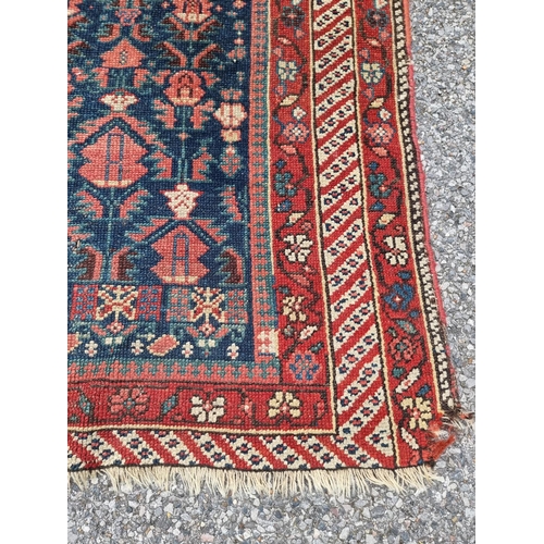 1115 - Two Persian rugs, largest, 208 x 126cm.