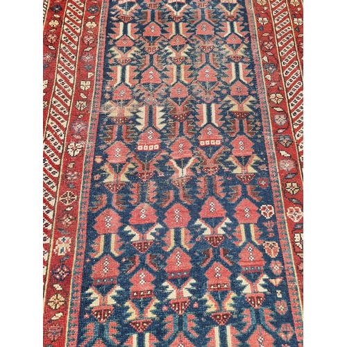 1115 - Two Persian rugs, largest, 208 x 126cm.