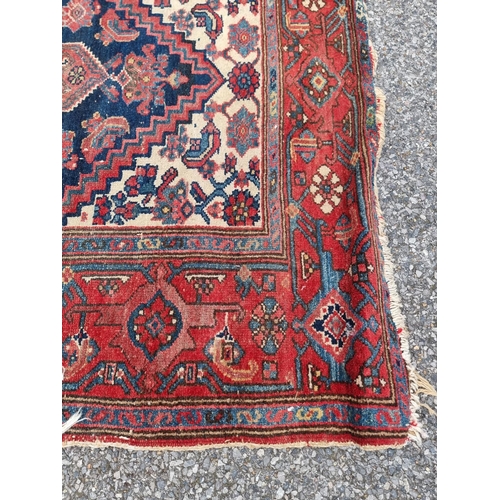 1115 - Two Persian rugs, largest, 208 x 126cm.