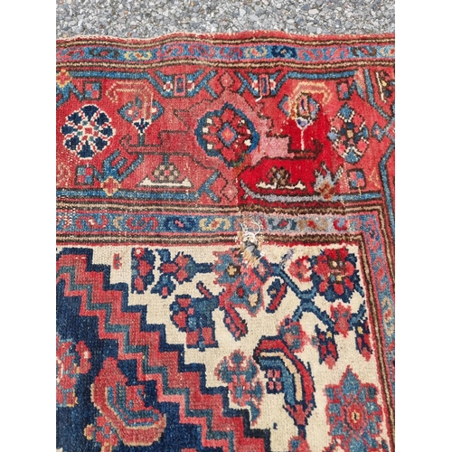 1115 - Two Persian rugs, largest, 208 x 126cm.