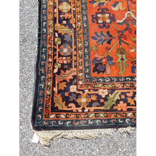 1116 - A Persian rug, having floral and geometric central field, 296 x 202cm.