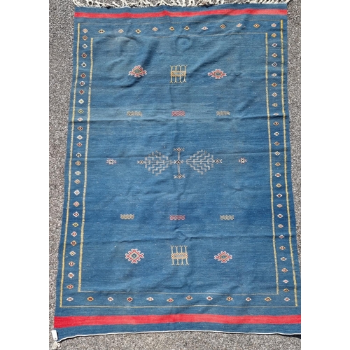 1118 - A Moroccan flat weave rug, on blue ground, 249 x 167.