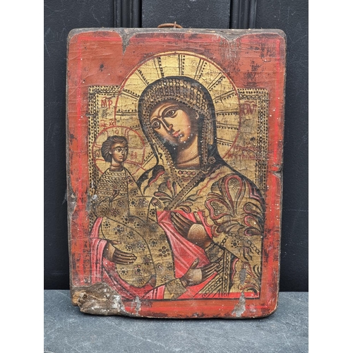 1198 - An antique Russian icon of 'The Blessed Virgin with Three Hands', inscribed, oil on canvas laid on p... 