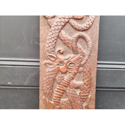 1218 - An old oak relief carved dragon panel, possibly Welsh, 20 x 84cm. 