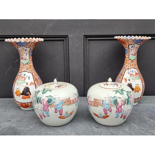 1221 - A large pair of Japanese Kutani vases, 39cm high, (one repaired); together with two smaller Japanese... 