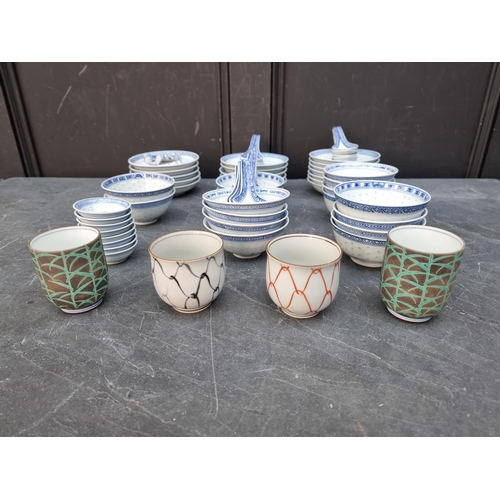 1224 - A Chinese blue and white porcelain part service; together with four Japanese cups. ... 