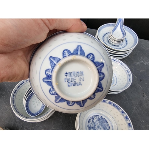 1224 - A Chinese blue and white porcelain part service; together with four Japanese cups. ... 