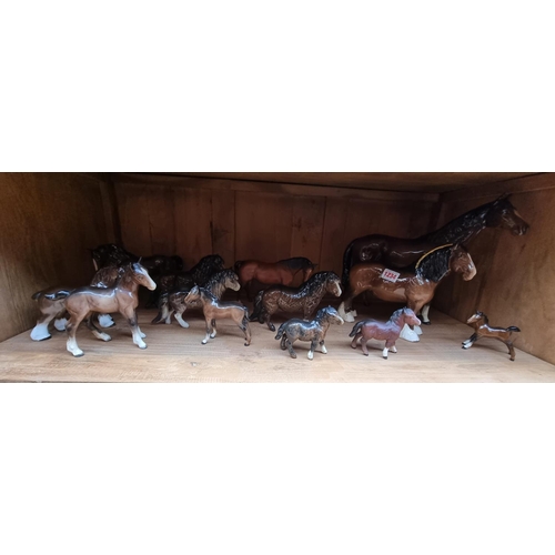 1234 - A collection of Royal Doulton and Beswick horses, (small chip to ear of one). (13)