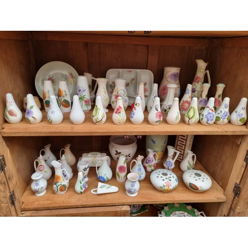 1236 - A large collection of Radford pottery, to include cruets. 