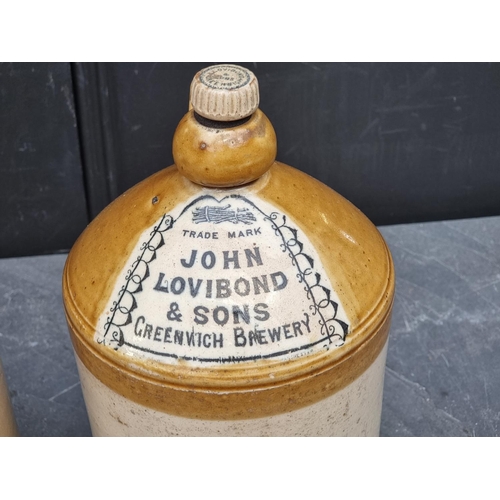 1238 - A large Victorian 'Lyle's' ginger beer bottle, total height 55cm; together with another 'John Lovibo... 