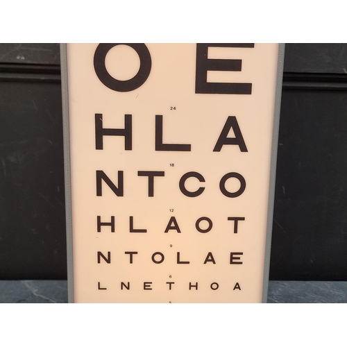 1249 - A Optometrist's illuminated eye chart, 58.5cm high, with power cable.