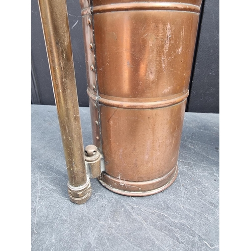 1250 - A vintage 'Waterloo' copper fire extinguisher, 59cm high; together with another vintage copper garde... 