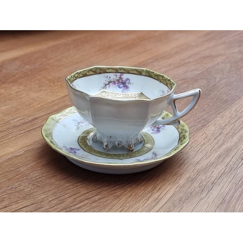 1253 - A collection of 19th century and later Continental porcelain, to include a Meissen cup and saucer; a... 