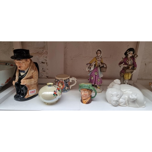 1257 - A Royal Doulton 'Winston Churchill' character jug; and six others. (7)