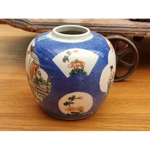 1259 - A Chinese famille rose jar and cover, 19cm high, (cover repaired); together with another Chinese fam... 